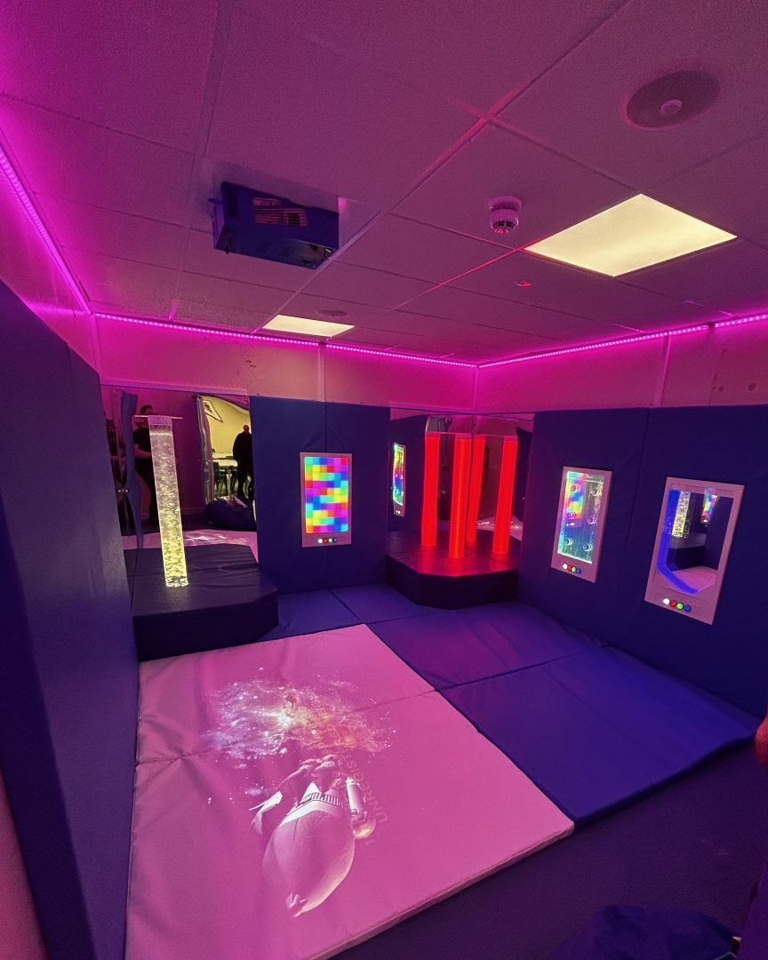SENse Tile installed into the ceiling projecting an interactive surface within a sensory room.