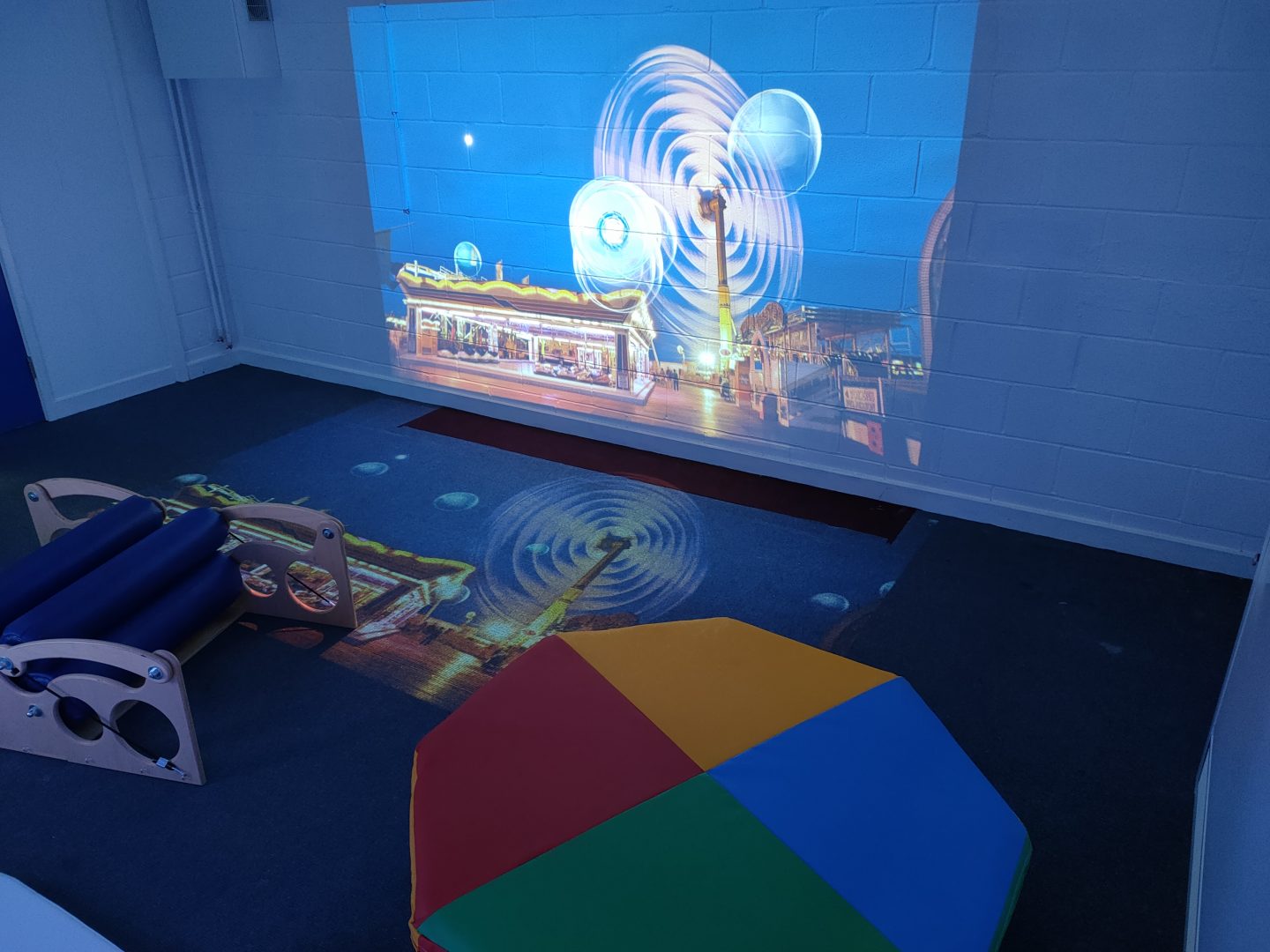Immersive area within a sensory room showing the interactive bubble pop on the wall and floor