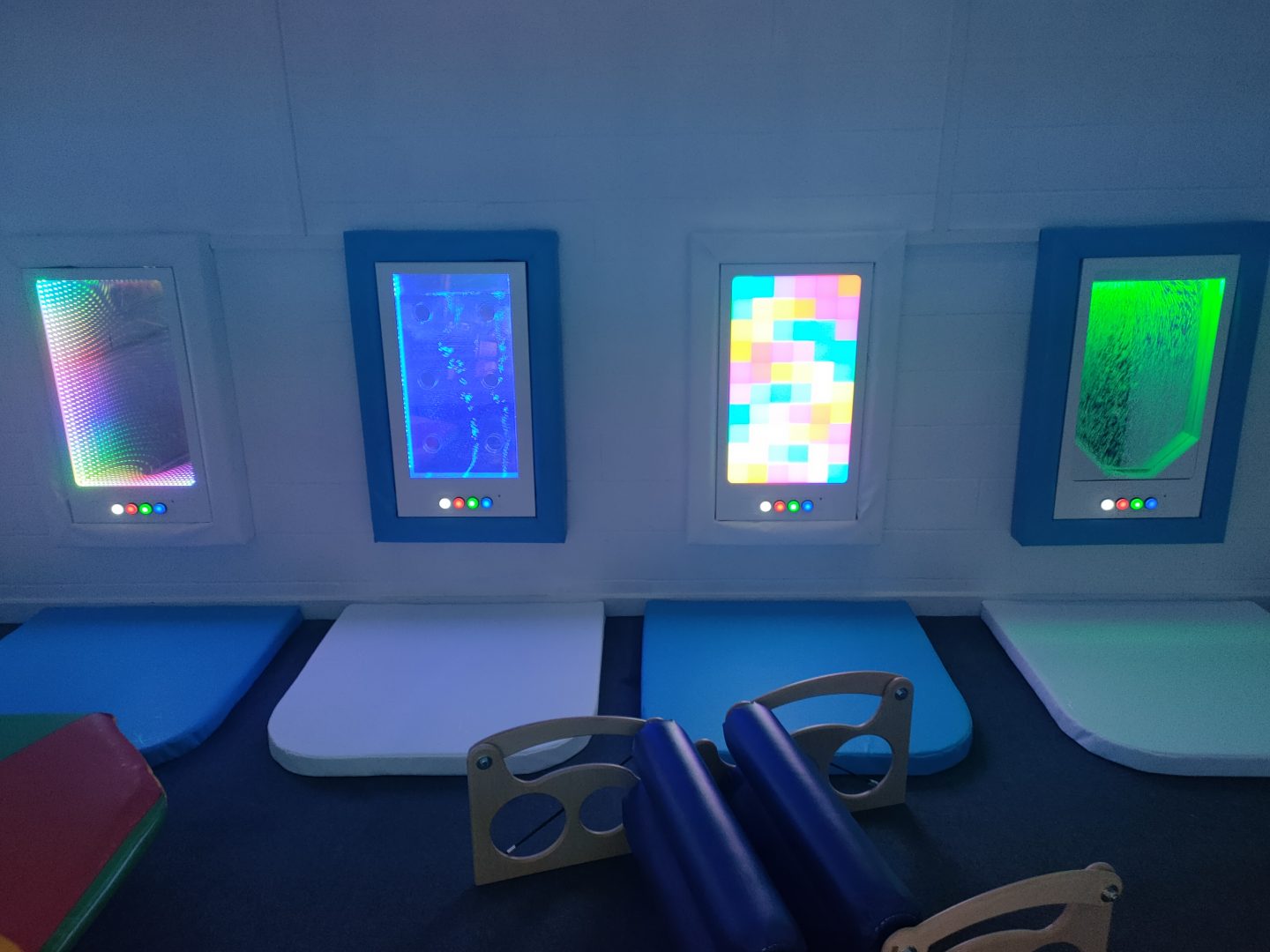 Bubble-lusion interactive sensory panel installed within a sensory room amongst other sensory panels