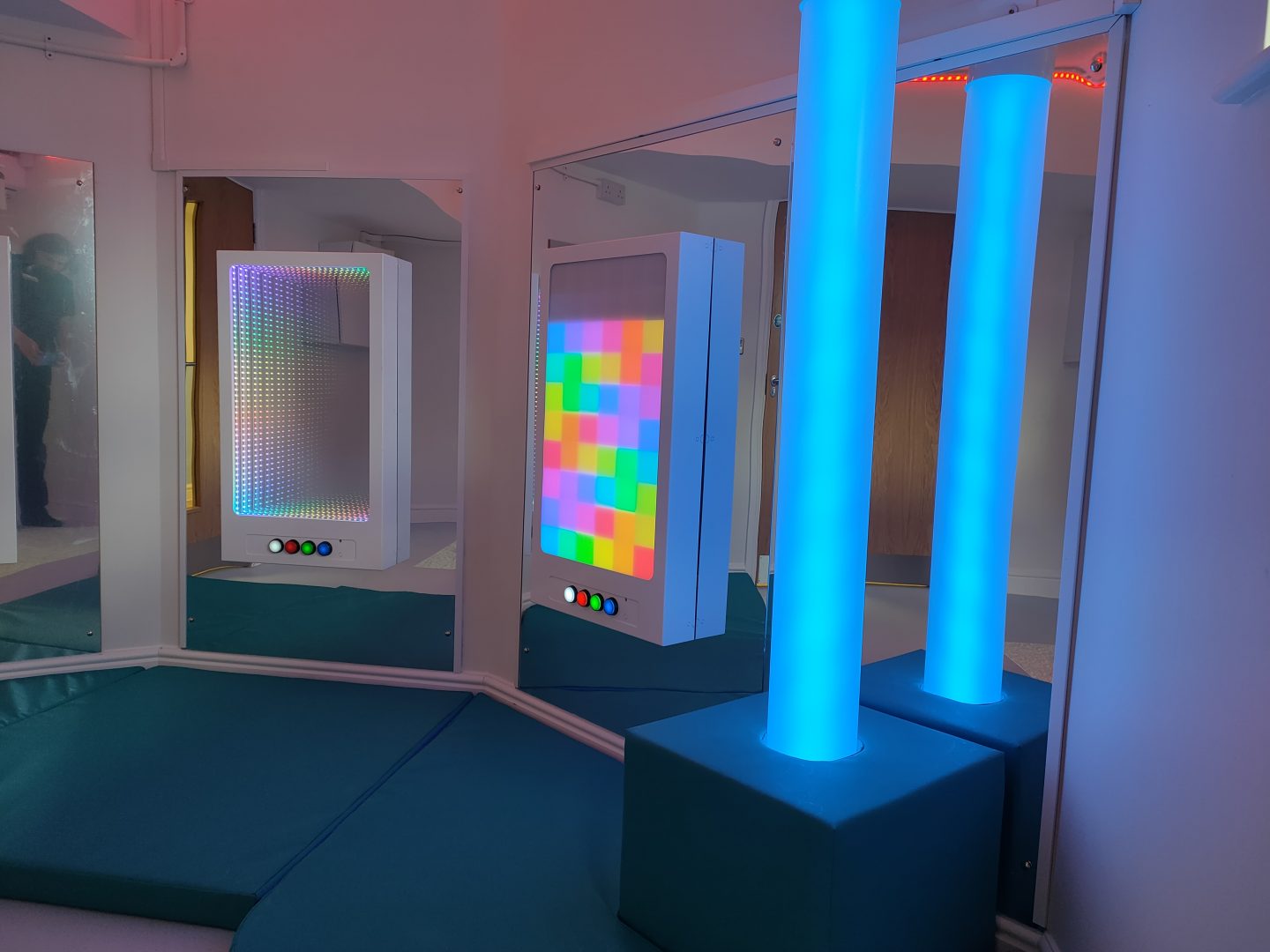 Sensory room with interactive panels and tubes