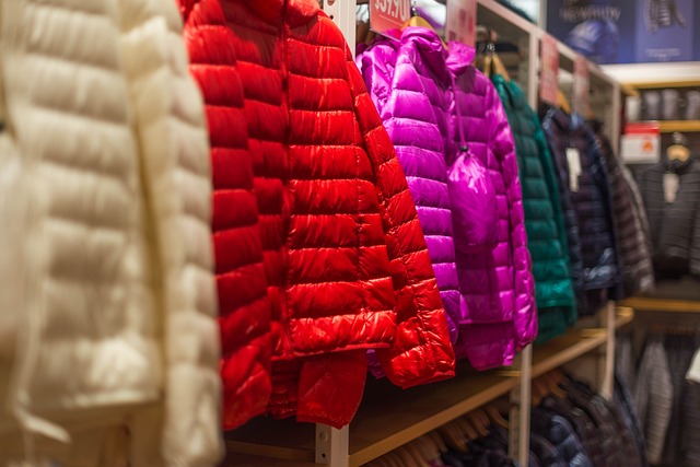 A row of coloured coats in a retail environment
